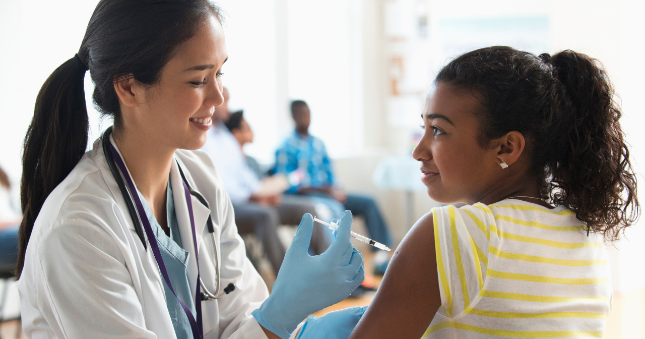 Provider gives young woman HPV shot