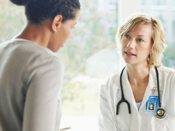 A woman and her provider talk
